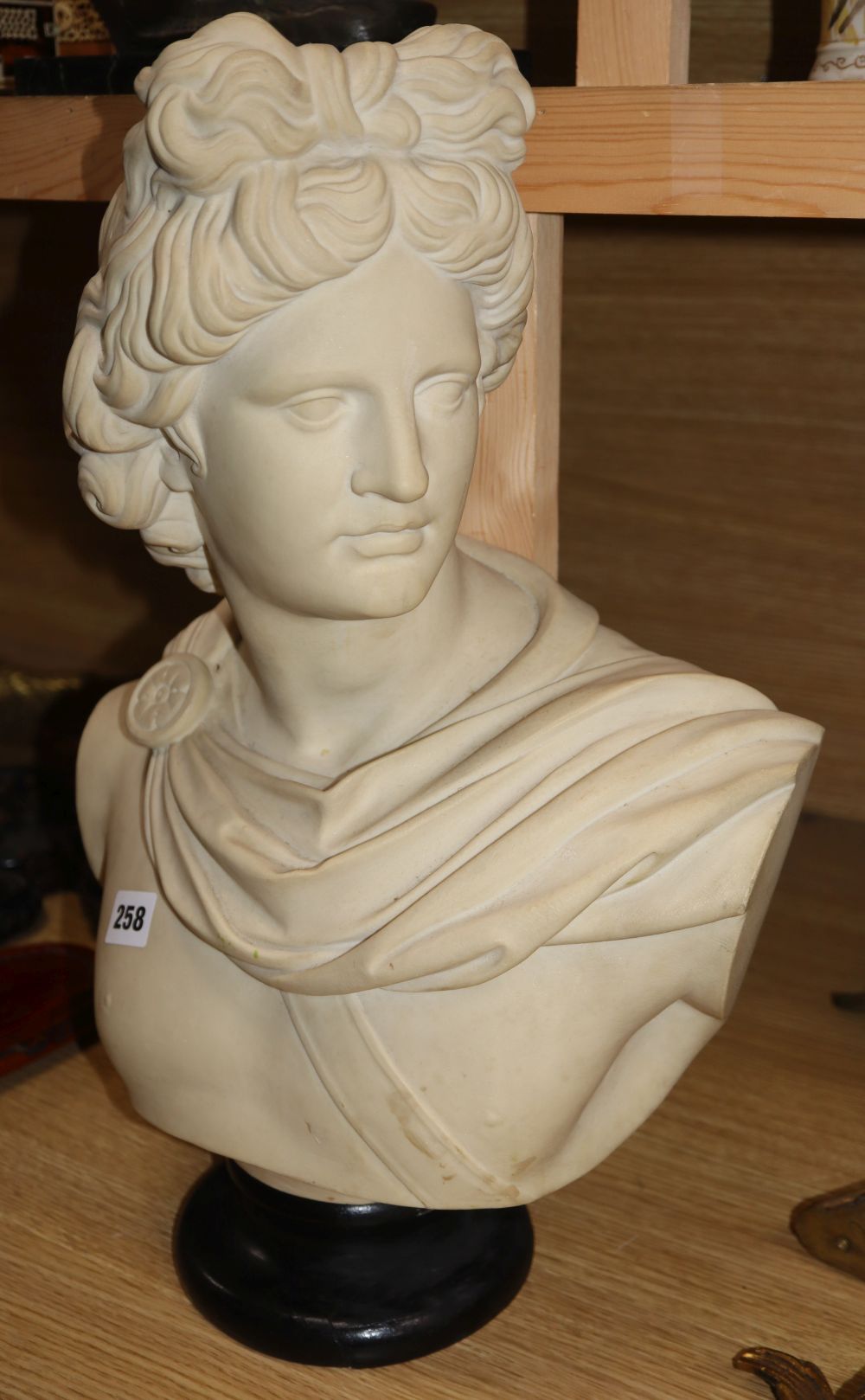 A composition bust of Apollo, marked 912 to the reverse, height 49cm